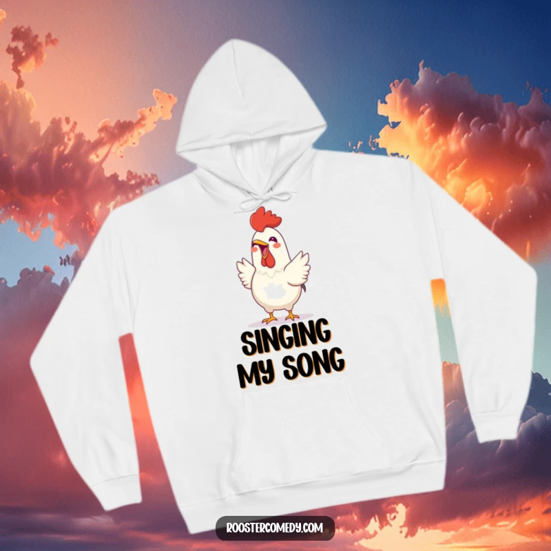 Funny Rooster hoodie featuring a cheerful bird in the act of crowing with its beak open, radiating pure joy and warmth.