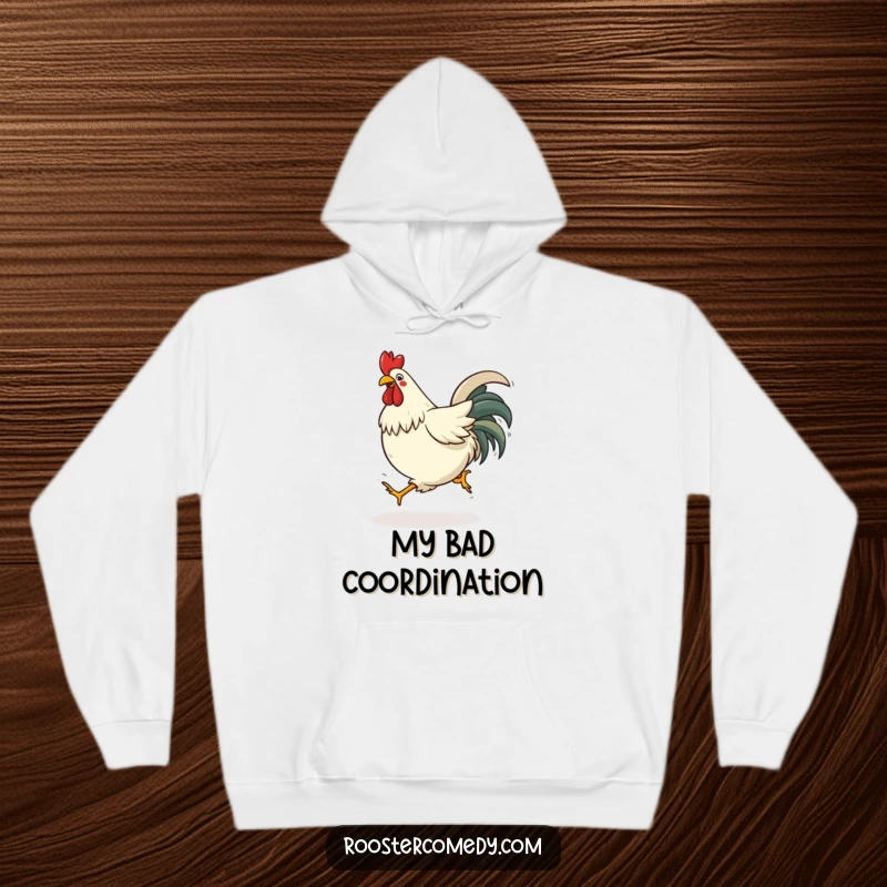 Funny tripping rooster hoodie showing a bird stumbling awkwardly, conveying comical misfortune.