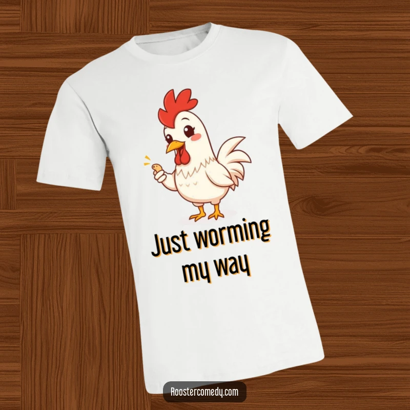 Funny Rooster T-Shirt: Cheerful rooster grins widely, presenting a tiny worm with a dramatic flourish, a comical wearable.